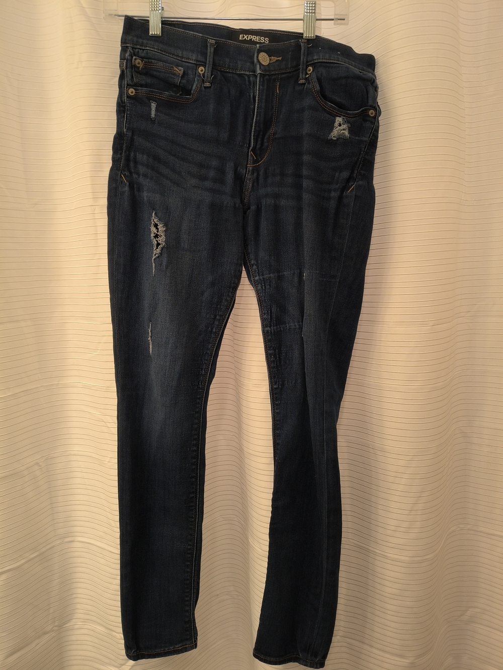 Express Women's Dark Blue Ripped Skinny Jeans